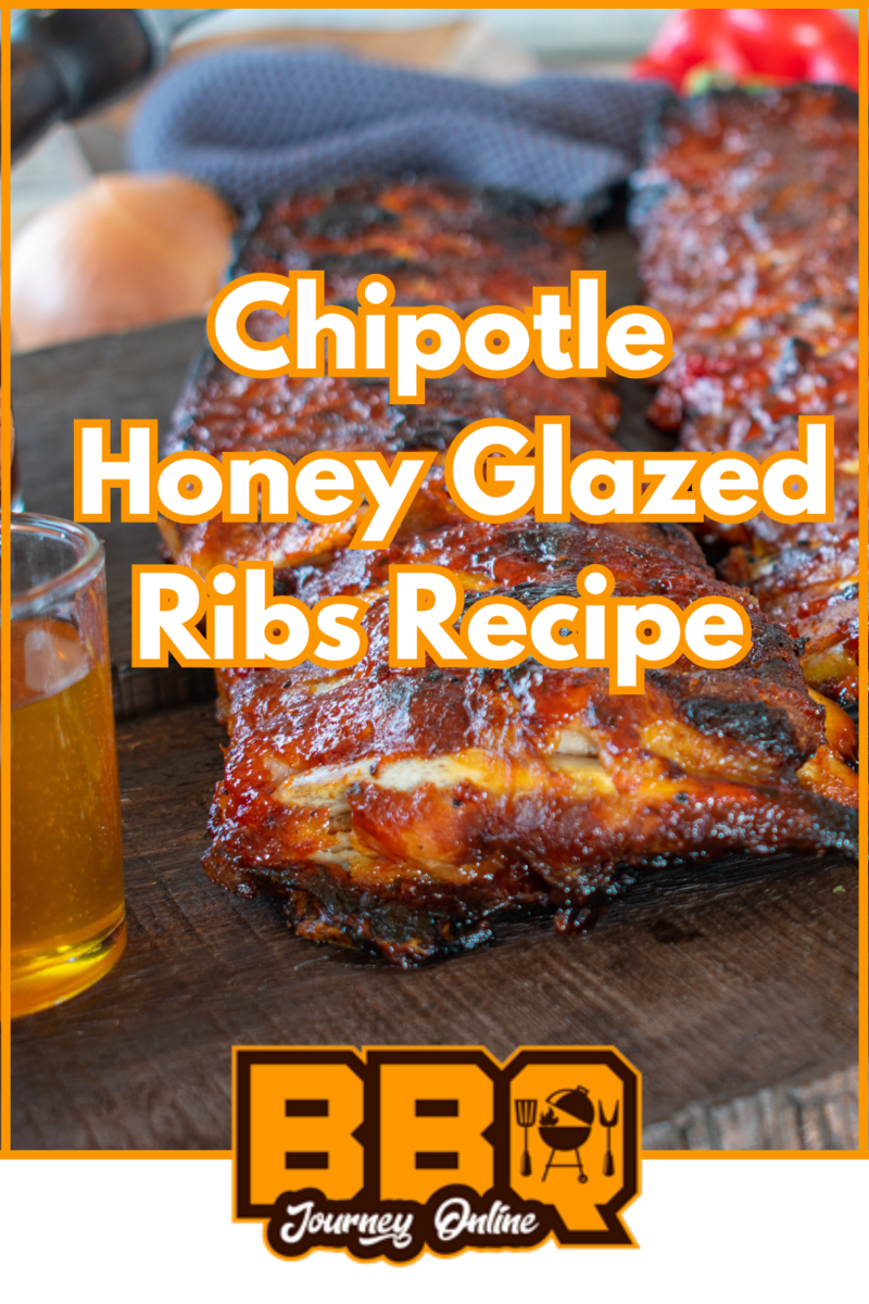 Close-up of chipotle honey glazed ribs on a wooden board, with a glass of honey, onions, and peppers in the background. Text reads "Chipotle Honey Glazed Ribs Recipe" and "BBQ Journey Online.